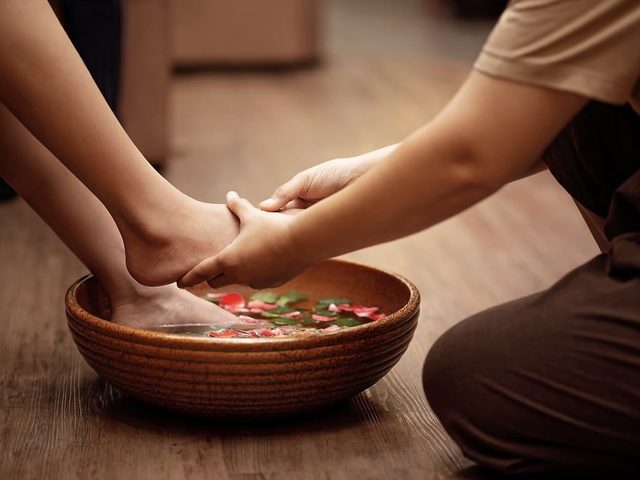 In-home foot spa ritual with rose petals — Cabo Travel Boutique
